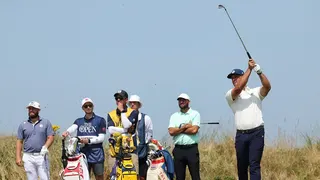 Bryson DeChambeau watches his shot at the 12th tee.
