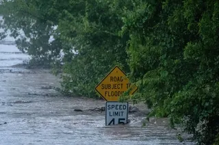 The Pedernales River floods along State Highway 16 on Thursday, July 16, 2026, in Fredericksburg, Texas. (AP Photo/Joel Angel Juarez)