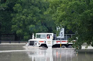 epa13115781 A Sisterdale Volunteer Fire Department truck moves through a high water near the Guadalupe River in Sisterdale,Texas, USA, 16 July 2026. Severe flooding is affecting parts of South-Central Texas and the Hill Country, particularly along the Guadalupe River. EPA/DUSTIN SAFRANEK