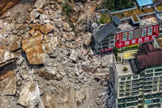 Hundreds of rescuers are racing against time to rescue Chongqing residents in southwestern China who were trapped under a landslide on Friday morning. Photo: Xinhua