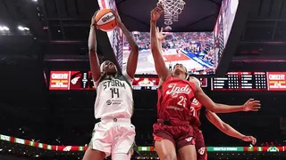 Dominique Malonga jumps highest to score