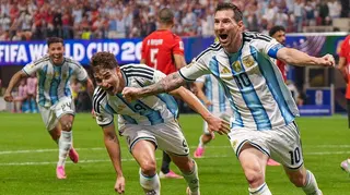 Lionel Messi, Julian Alvarez and Enzo Fernandez celebrate after a goal against Egypt
