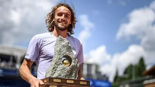 Stefanos Tsitsipas holds the Swiss Open trophy