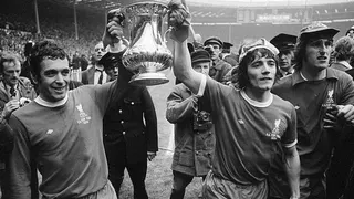 Kevin Keegan holding the 1974 FA Cup trophy aloft at Wembley