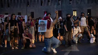People take part in a demonstration calling for justice for Abderrahim Fakir