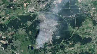 Satellite view of the Wildberries logistics hub in Elektrostal near Moscow shows warehouses engulfed in massive fires and heavy damage after Ukrainian drones struck the site