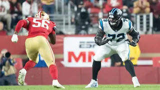 Taylor Moton lines up during an NFL game