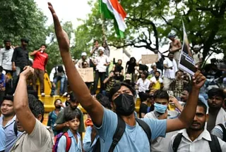 A Cockroach Janta party (CJP) supporter shouts at Jantar Mantar in Delhi on Thursday during the ongoing protest to demand the resignation of India's education minister Dharmendra Pradhan.