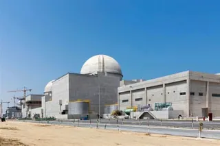The Barakah nuclear power plant in Abu Dhabi’s western desert. It has a series of concrete buildings and the dome of its reactor can be seen.