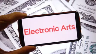 POLAND - 2025/09/28: In this photo illustration, the Electronic Arts company logo is seen displayed on a smartphone screen with United States dollar banknotes in the background. (Photo Illustration by Piotr Swat/SOPA Images/LightRocket via Getty Images)