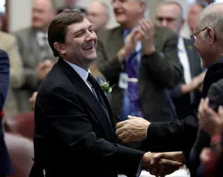 two men shaking hands