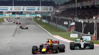 Red Bull's Max Verstappen leads Mercedes' Lewis Hamilton into the first corner of the 2017 Malaysian Grand Prix