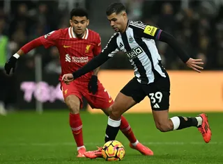 Newcastle United’s Brazilian midfielder Bruno Guimaraes (right) vies for the ball with Liverpool’s Luis Diaz during their Premier League match at St James’ Park in Newcastle-upon-Tyne. Guimaraes’ future at Newcastle is uncertain amid reported interest from Arsenal. — AFP pic