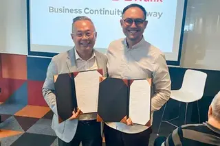 Justin Quek, CEO of OrangeTee and Deputy Group CEO of Realion Group (right), with Dr Tan Tee Khoon, head of KF Property Network.