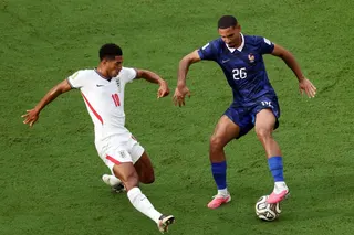 France defender Maxence Lacroix shielding the ball from England midfielder Jude Bellingham in the World Cup third-place play-off in Miami on July 18, 2026.