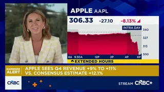 Apple shares sliding on revenue guidance