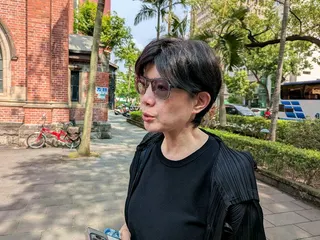 策進會董事長賴秀如31日參加林榮基告別禮拜，受訪時語帶哽咽感念林榮基。（記者廖士...