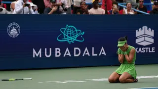 Alexandra Eala on the floor in tears
