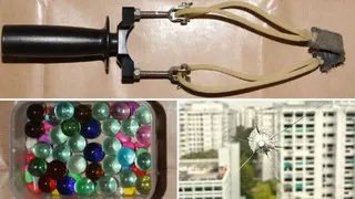 56岁男子用弹弓射玻璃弹珠 一组屋单位窗户受损
