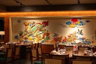 Traditional dragon mural on the wall of Linkus.