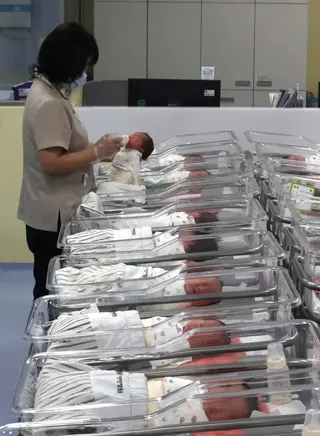 ▲出生第一天就開戶！南韓「嬰兒股神」熱潮一年翻3倍（圖／美聯社／達志影像）