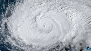 A satellite image shows Typhoon Dolphin approaching Japan's Okinawa
