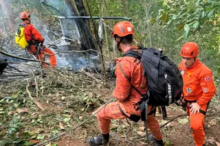 Firefighters at the scene of a deadly helicopter crash in Alto da Boa Vista, Rio De Janeiro, Brazil, August 8, 2026. Corpo de Bombeiros Militar do Estado do Rio de Janeiro/Handout via REUTERS THIS IMAGE HAS BEEN SUPPLIED BY A THIRD PARTY