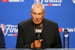 A man holds a microphone