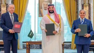 (From left) Turkish President Tayyip Erdogan, Saudi Crown Prince Mohammed bin Salman, and Pakistan’s Prime Minister Shehbaz Sharif pose after signing a joint defence agreement in Mecca on Friday. Photo: Handout/Reuters