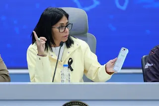 CARACAS, VENEZUELA - JULY 2: Delcy Rodriguez, Venezuela's interim president, shows her phone with a conversation during a press conference regarding the situation in Venezuela after the double earthquake that struck the country at Miraflores Palace on July 2, 2026 in Caracas, Venezuela. According to the U.S. Geological Survey (USGS), the main earthquake on June 24, 2026 was followed by a 7.5-magnitude aftershock less than a minute later. The number of fatal victims increased to 2595, while the n