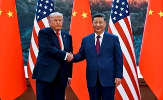 美國總統川普（左）與中國國家主席習近平5月14日在人民大會堂會面。 (路透)