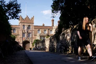 People walk outside Jesus College, where Jason Arday worked, at the University of Cambridge in Britain on August 7. Photo: EPA