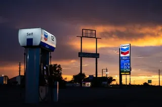Gas and diesel prices are displayed at a gas stationa