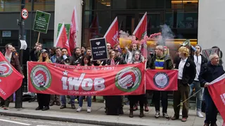 Protestors with an IWGB banner outside Take-Two's London office.