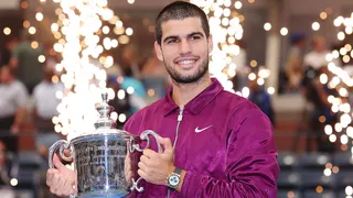 Carlos Alcaraz with the US Open trophy in 2025