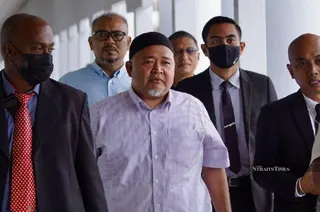 The Sessions Court today ordered Mohamad Hilmi Abdul Wahab, former political secretary to the Kedah Menteri Besar, to enter his defence on two charges of soliciting and accepting bribes in connection with rare earth element (REE) mining projects three years ago. NSTP FILE PIC