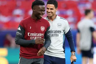 Arsenal's Bukayo Saka and manager Mikel Arteta during training