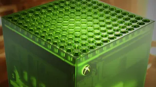 A green, see-through Xbox Series X, as seen diagonally down from the top, via its curved ventilation grill.