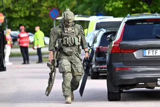 An armed police officer
