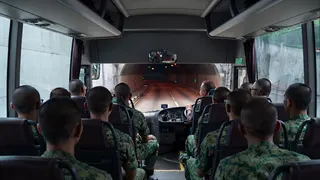 An artist’s impression of recruits travelling between Singapore and Pulau Tekong via an undersea tunnel.