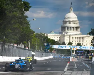 Kyle Kirkwood leads race cars down Pennsylvania Avenue toward the U.S. Capitol