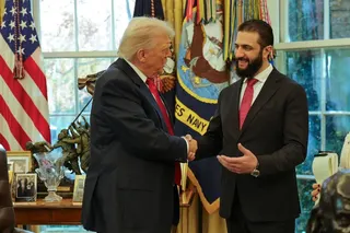 US President Donald Trump (left) shakes hands with Syria’s President Ahmed al-Sharaa at the White House in Washington in November. Photo: Syrian Presidency press office via AP