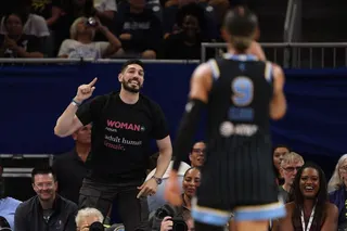 CHICAGO, ILLINOIS - AUGUST 23: Former basketball player Enes Kanter Freedom and Natasha Cloud #9 of the Chicago Sky yell at one another during the second half between the Chicago Sky and the Indiana Fever at Wintrust Arena on August 23, 2026 in Chicago, Illinois. NOTE TO USER: User expressly acknowledges and agrees that, by downloading and or using this photograph, User is consenting to the terms and conditions of the Getty Images License Agreement. Michael Reaves/Getty Images/AFP (Photo by Mich