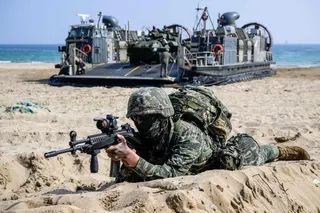 A South Korean marine takes position during the “Ssangyong 2023 Exercise” joint landing operation by US and South Korean Marines in the southeastern port of Pohang in March 2023. Photo: AFP
