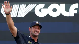 Bryson DeChambeau waves to fans in front of a LIV Golf logo during day four of LIV Golf New York at Trump National Golf Club in August 2026