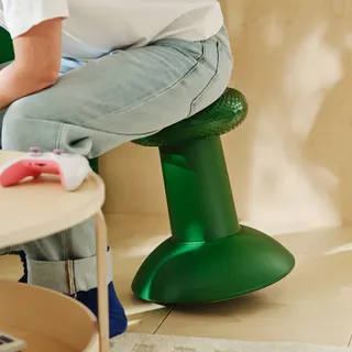Image may contain Furniture Bar Stool Child and Person