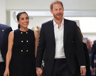 Meghan and Harry holding hands