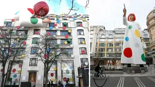 AFP / Chesnot via Getty Images A composite image shows on the left the sculpture bent over the store painting dots that cover the facade of the building, and on the right a depiction of the huge sculpture in the likeness of Yayoi Kusama standing up between the headquarters of the Maison Louis Vuitton and the Samaritaine department store on March 06, 2023 in Paris, France.