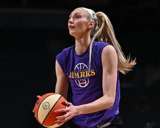 Cameron Brink prepares to take a shot during warmups before a Los Angeles Sparks game.