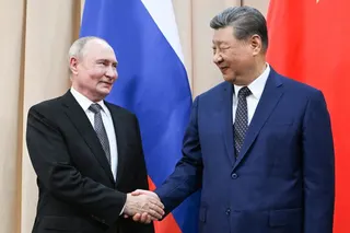 Russian President Vladimir Putin and Chinese President Xi Jinping shake hands during a meeting on the sidelines of the Shanghai Cooperation Organisation summit in Bishkek, Kyrgyzstan, on August 31, 2026. [Pool/Reuters]
